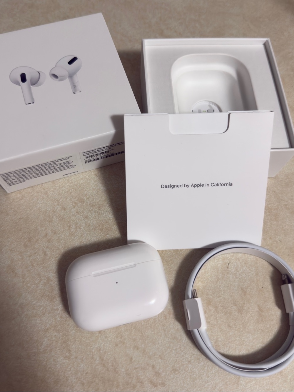 Apple AirPods Pro (White) with Charging Case and Cable